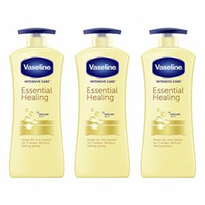 Vaseline hand and body lotion Intensive Care Moisturizer for Dry Skin Essential Healing Clinically Proven to Moisturize Deeply With One Application, 20.3 Ounce (Pack of 3)