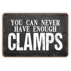8" x 12" You Can Never Have Enough Clamps In Distressed Asphalt Metal Sign